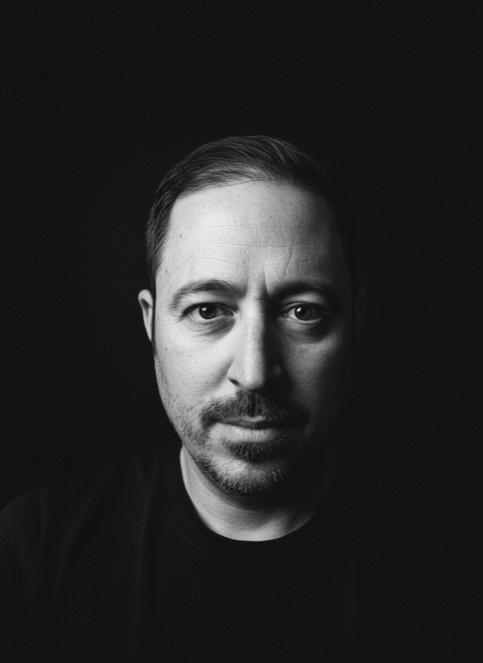 Black-and-white portrait of Simon Gelfand